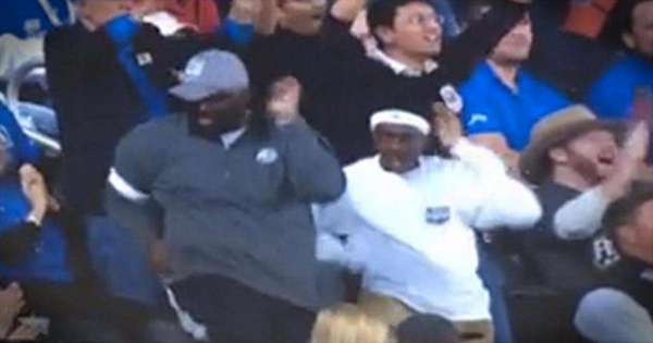 Father and Son Dancing ‘Happy’ at This Basketball Game