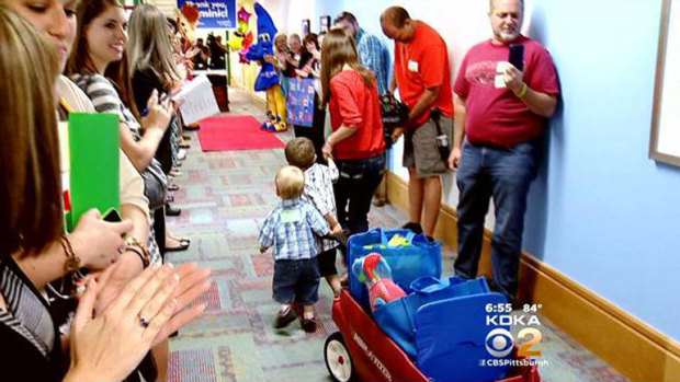 make a wish kid shares donates toys