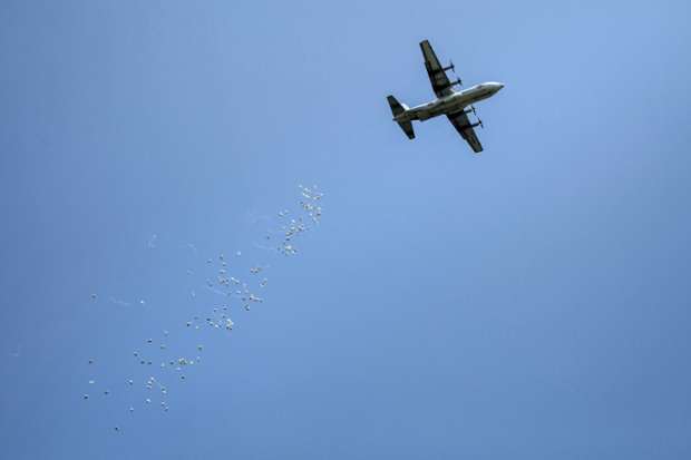 red cross drops humanitarian aid