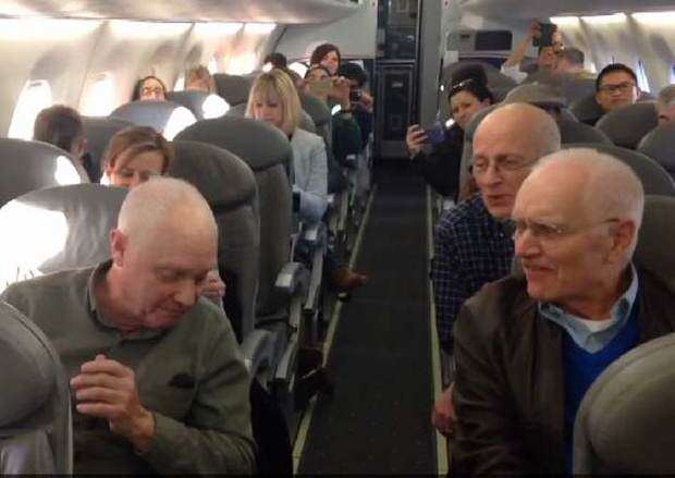 barbershop Quartet sings on a plane