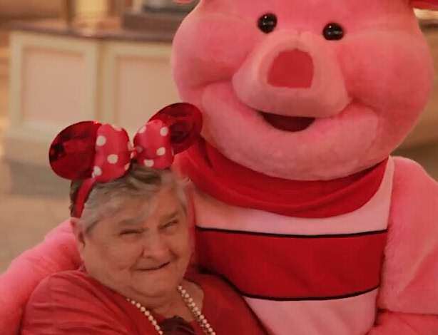 seniors-lady-with-Piglet-DisneyWorld-YouTube-SignatureHealth-submitted