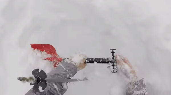complete burial and rescue of skier