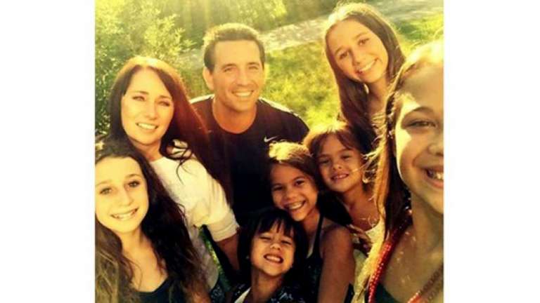 Couple adopts 4 Girls