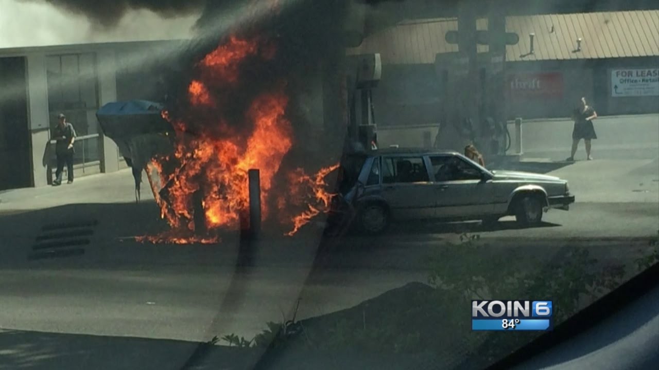 woman pulled from burning car