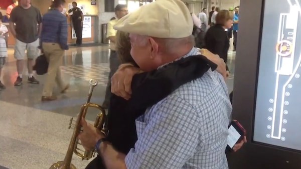 man serenades wife with What a wonderful world