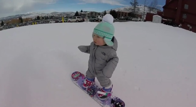 baby snowboarder