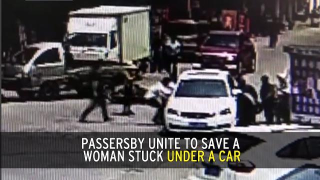 samaritans rescue woman from under a car