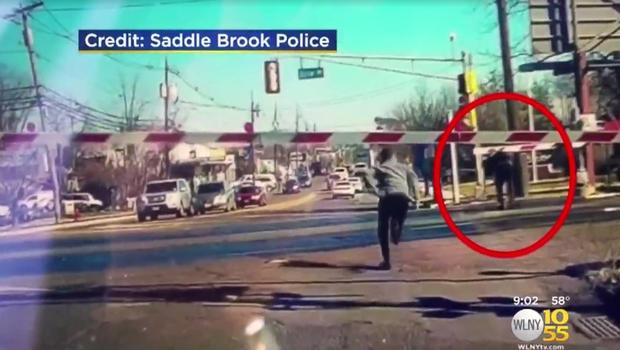 samaritan saves woman from train