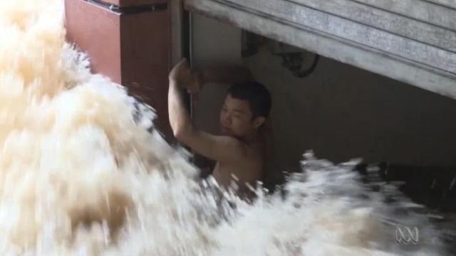 man rescued flooding china
