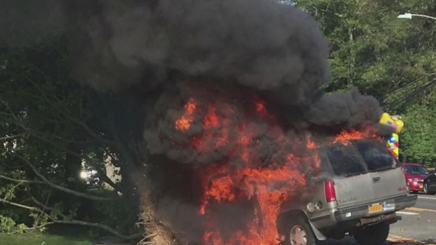 samaritans pull driver from burning suv