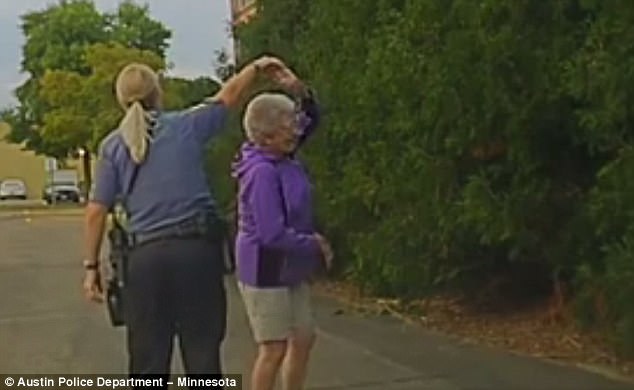 cop dances with woman2