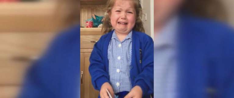 little girl cries baby brother