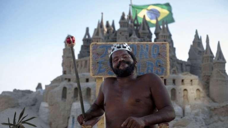 man lives in sand castle