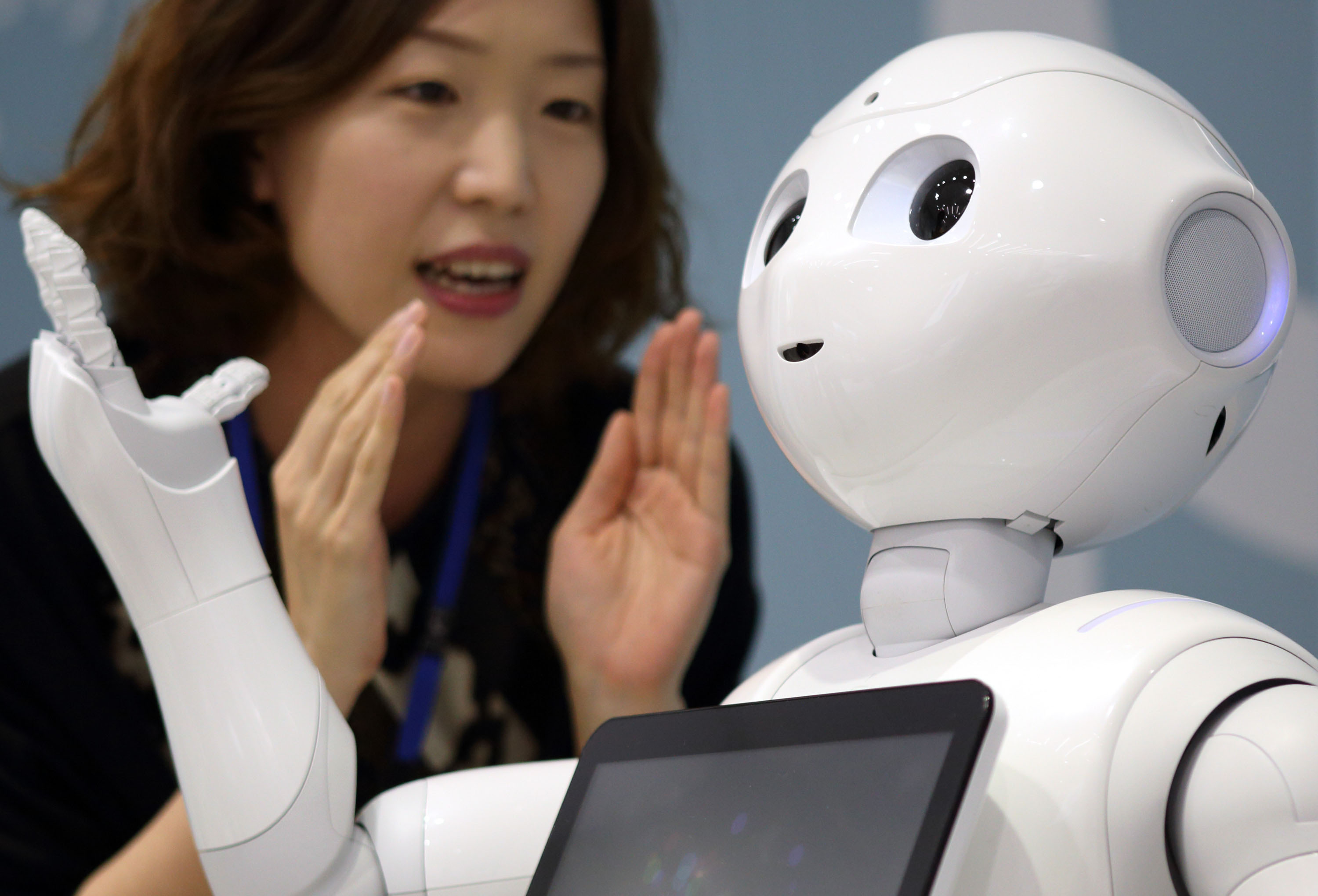 SoftBank Corp.'s Humanoid Robot Pepper Interacts With Customers At A SoftBank Store