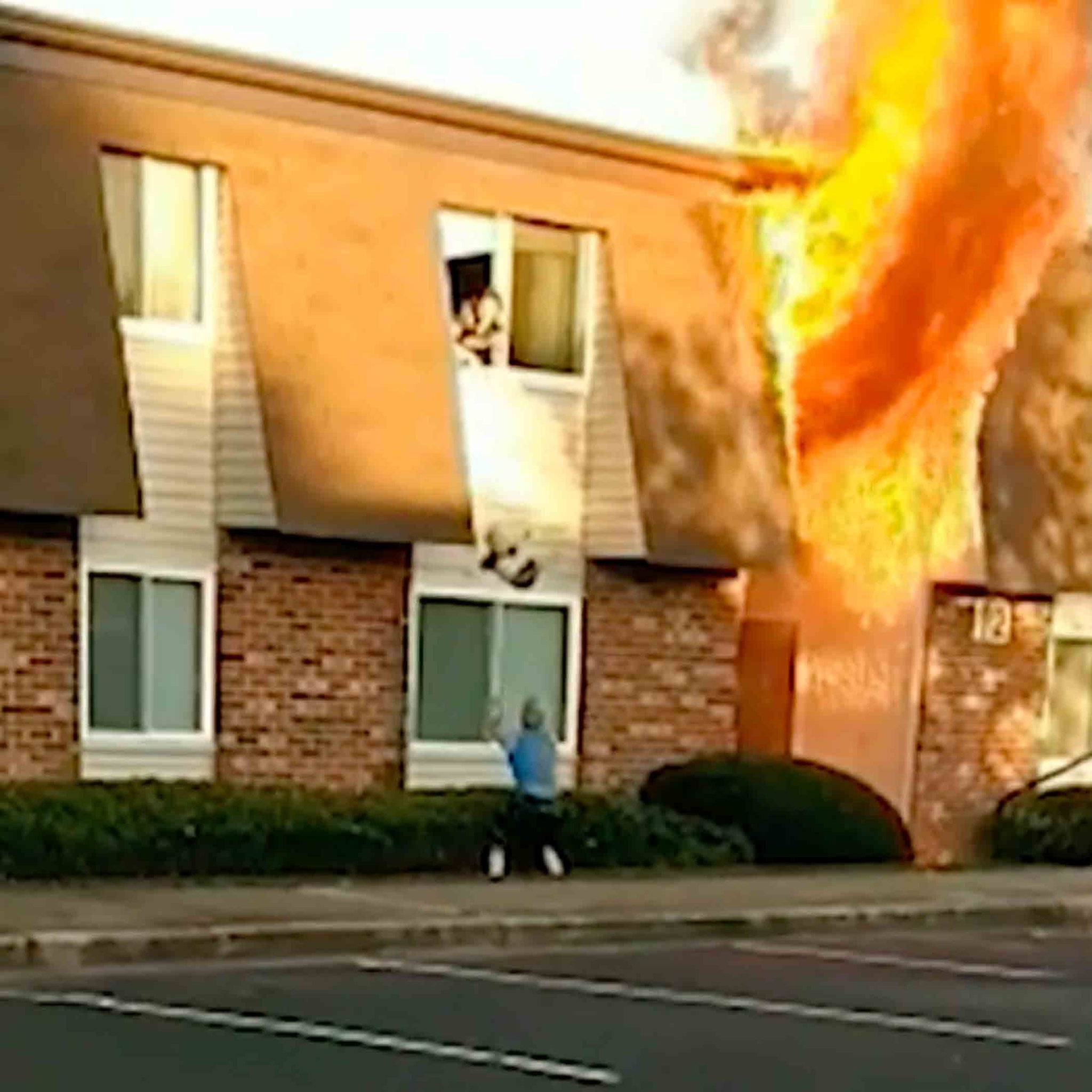 Marine-Catches-Baby-Thrown-From-Burning-Building
