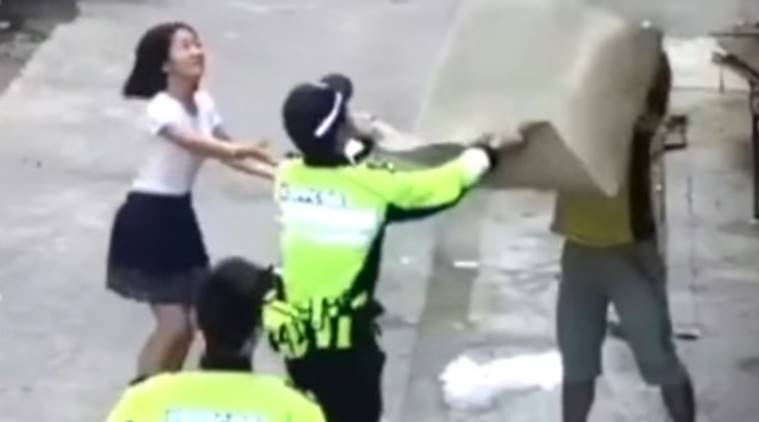 pedestrians rescue child holding onto power wire