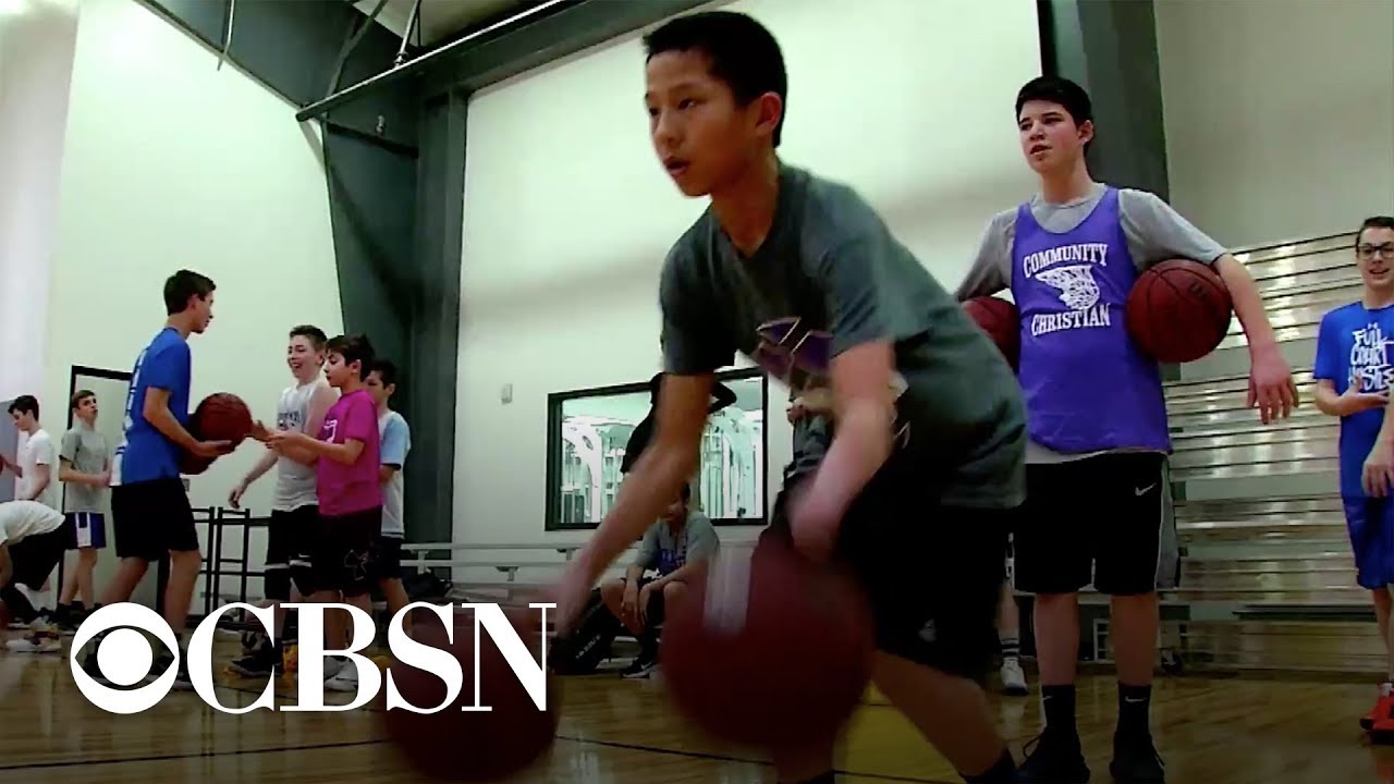 boy with one hand rewarded for inspiring others