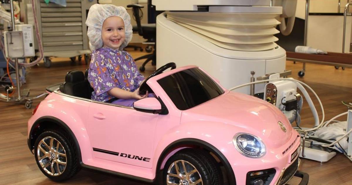 kids get cars to drive into surgery