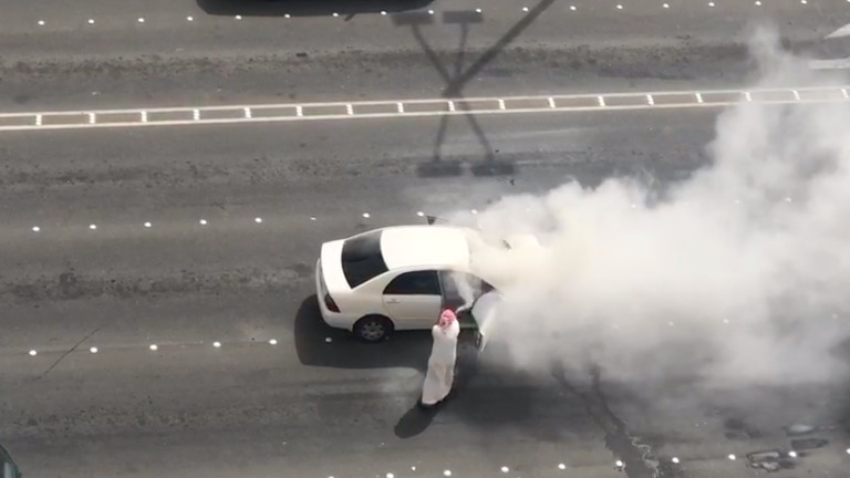 samaritan-to-the-rescue-as-car-catches-fire