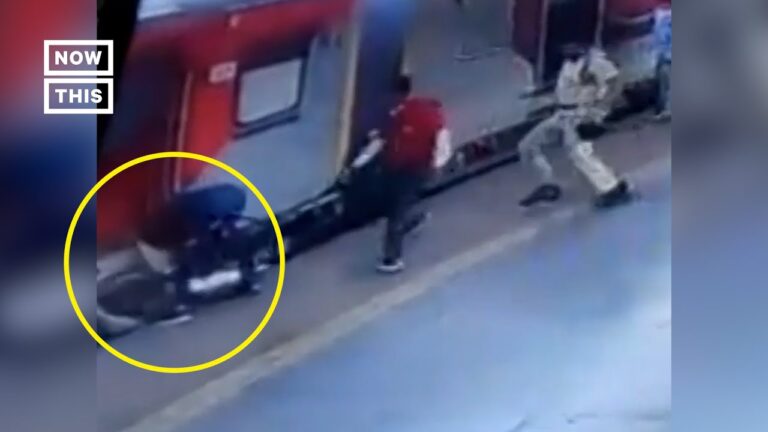 samaritans-rescue-woman-from-train-tracks