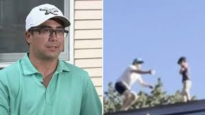 man saves boy at theme park