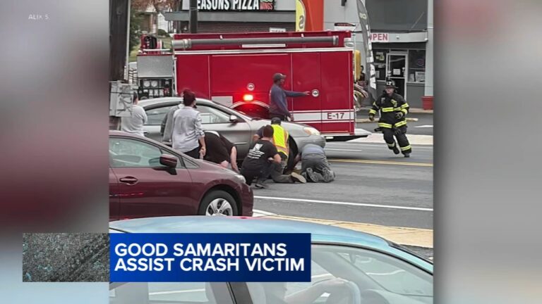 samaritans save trapped man under car