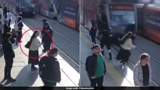 moment security guard saves woman from train