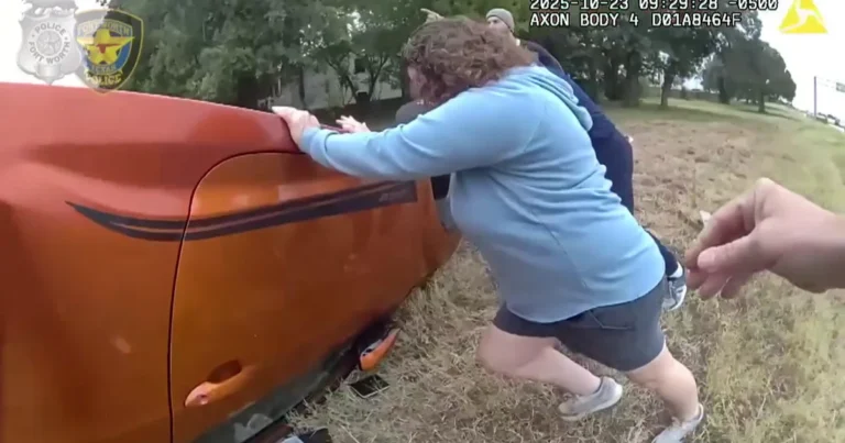 officers and bystanders lift car